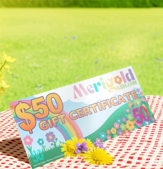 Colorful gift certificate for $50 on a red and white checkered tablecloth with flowers.